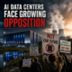 Protesters rally with signs against AI data centers over environmental and community concerns